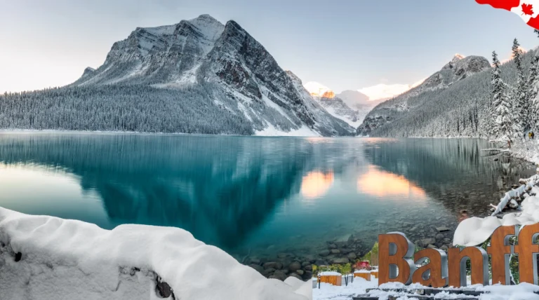 Lake Louise in Banff National Park, Canada, surrounded by snow-capped mountains and crystal-clear turquoise water in winter